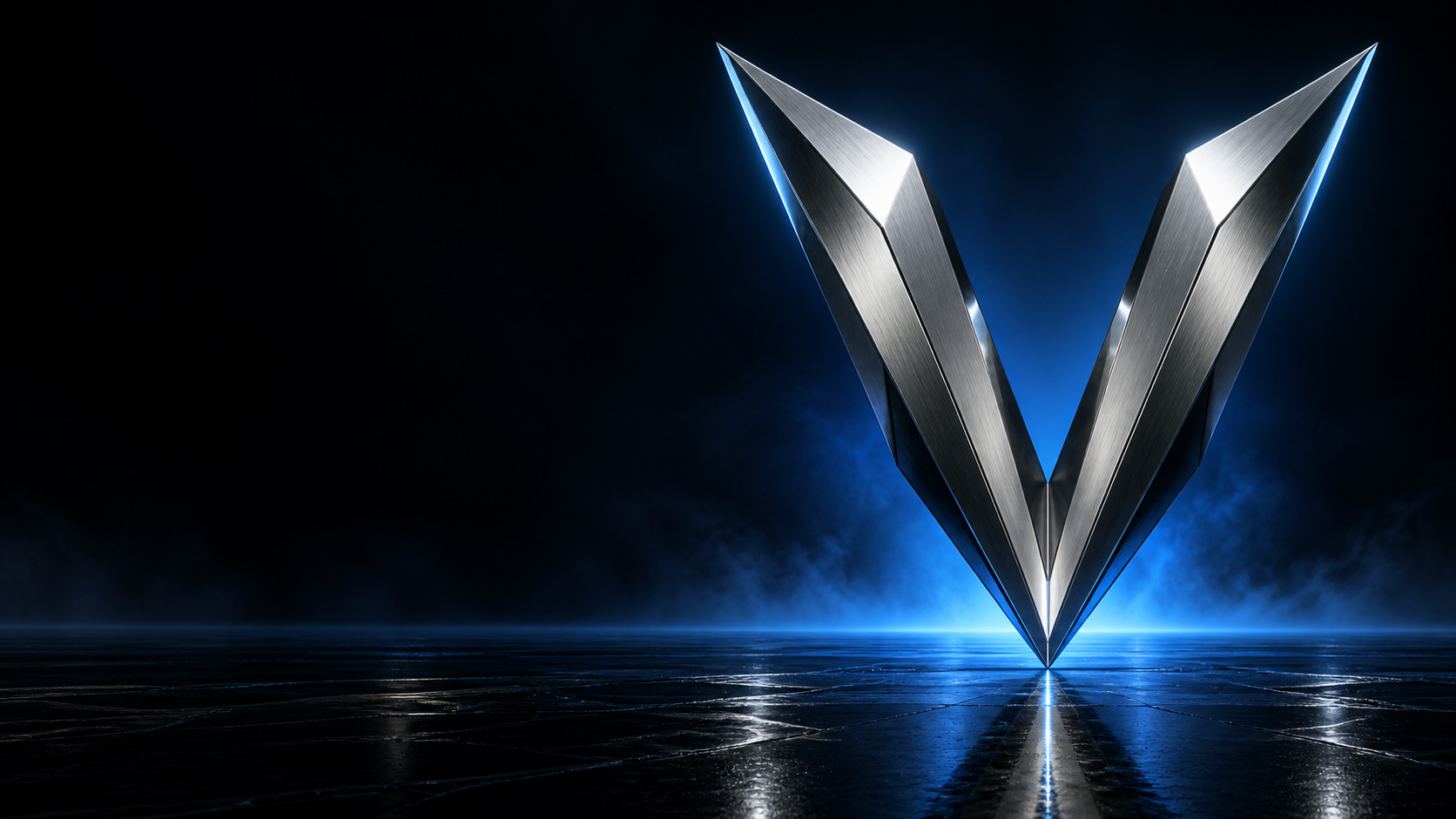 Sculptural titanium Vanguard emblem with electric blue illumination